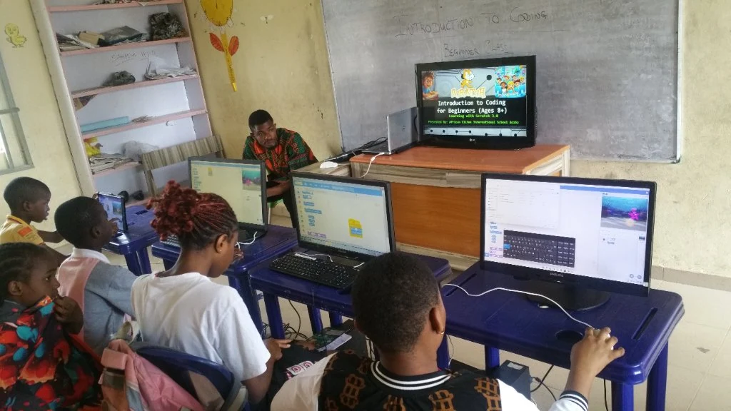 Girls learning digital skills